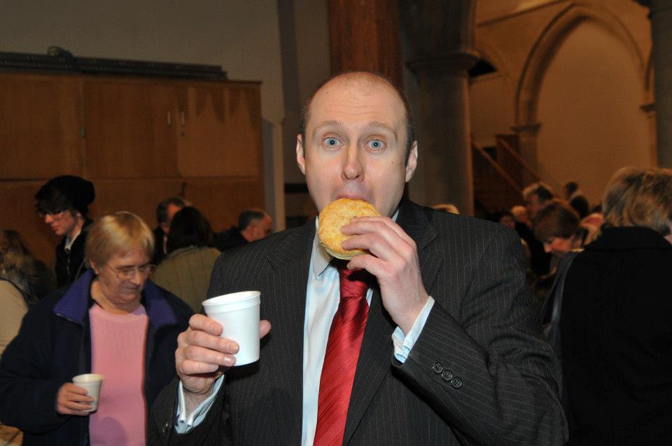 Neil enjoying a Mince Pie